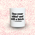 Duftkerze „One year older and still a bitch.“ von Kerzen der Herzen, Sojawachs im Glas